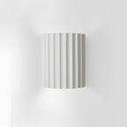 STYLISH RESIN WALL LAMPS - LUMIRESIN in cool white along a hallway