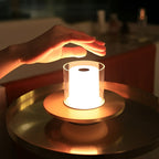 Cordless Flameless Candle Lamp – LumiFlame Gesture-Control LED Light in silver on a desk